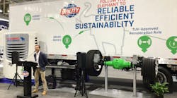 Utility Trailer VP Andrew Bennett showcasing the new Cargobull hybrid units at TMC.