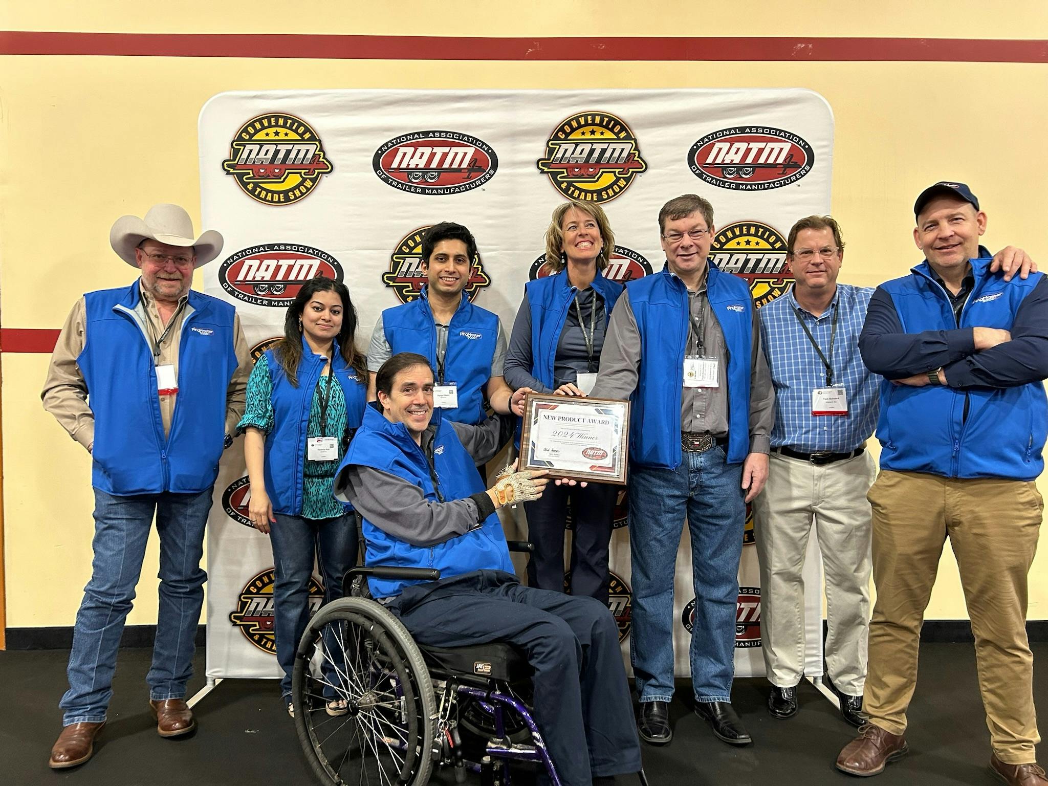 The Matrack Inc. team shows off the Innovative Breakthrough and Manufacturer&rsquo;s Favorite awards for the PingMaster 5000 GPS tracker.