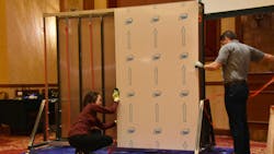 The 3M team demonstrated the proper technique for applying acrylic foam tape by assembling a side wall during the NATM presentation. The 3M team demonstrated the proper technique for applying acrylic foam tape by assembling a side wall during the NATM presentation.