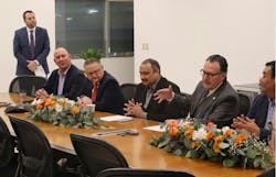 EnTrans CEO Ryan Rockafellow looks on as Mexican officials react to his presentation on the success of the OEM’s Juarez plant. EnTrans CEO Ryan Rockafellow looks on as Mexican officials react to his presentation on the success of the OEM’s Juarez plant.