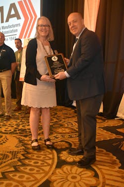 Karen Czor accepts one of the three safety awards En Trans took home this year. Karen Czor accepts one of the three safety awards En Trans took home this year.