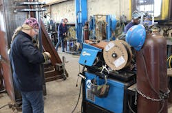 Women are welders, too. Kalyn Siebert’s team includes Natalie McCarley, at left, and Annie Lewis, in the background. Women are welders, too. Kalyn Siebert’s team includes Natalie McCarley, at left, and Annie Lewis, in the background.