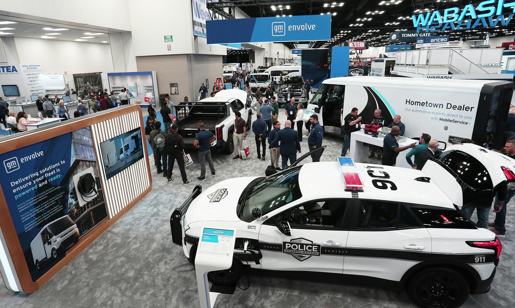 The GM Envolve booth at NTEA's Work Truck Week 2025 featured the manufacturer's range of vocational vehicles, upfit for various applications.