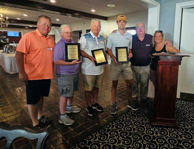 Pictured left to right are Jeff Stregiel, Lance Hampton (on behalf of Haley Woodhams), Ron Kneule, Spencer Andree, Skip Coder and Melissa Coder.