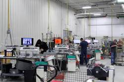 Workers stay busy assembling harnesses in Peterson’s wiring harness facility. Workers stay busy assembling harnesses in Peterson’s wiring harness facility.